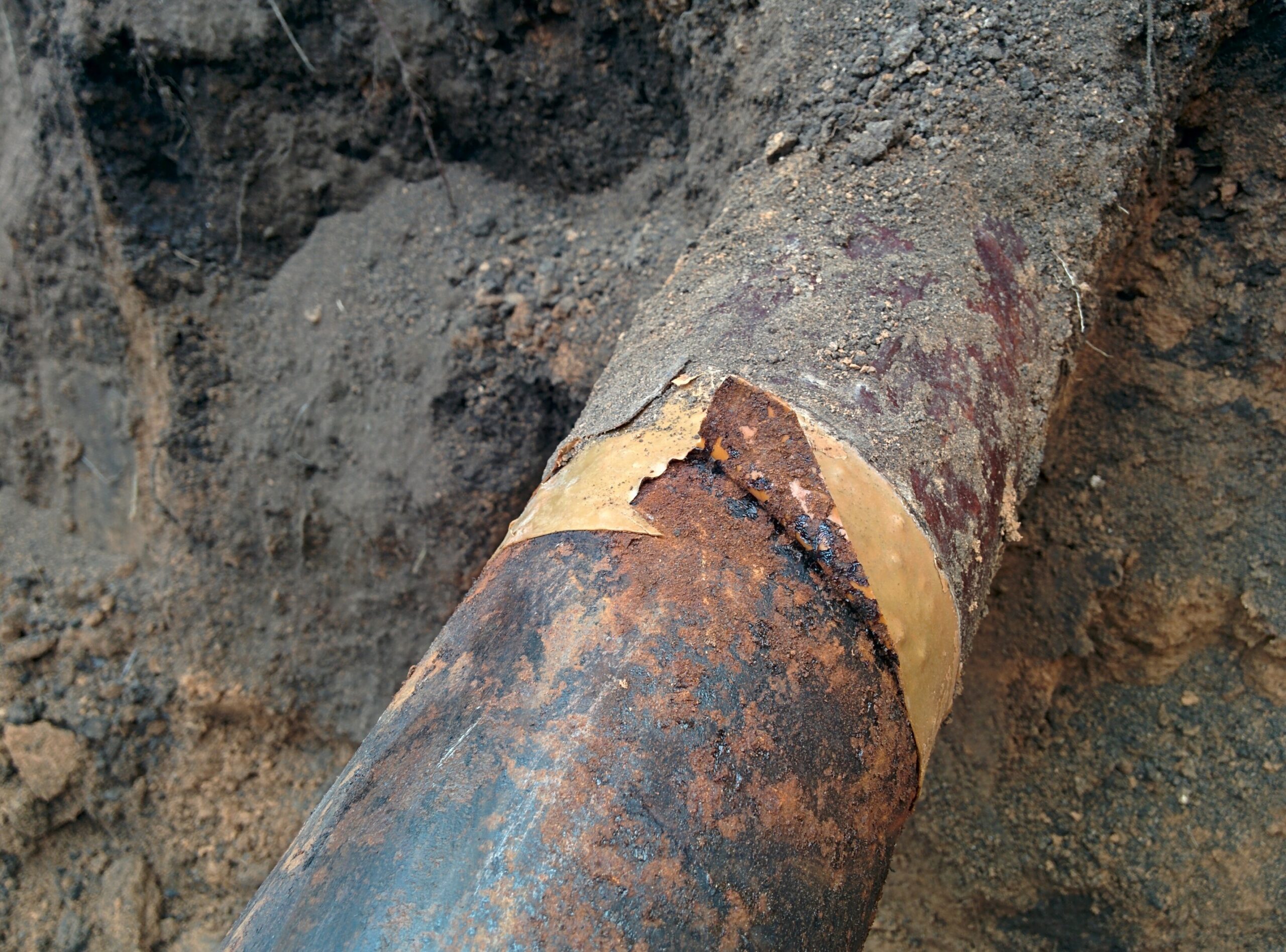 a pipe with corrosion under insulation