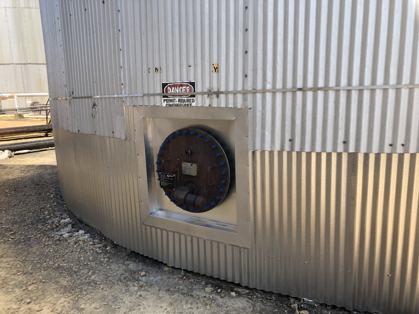 A large outdoor industrial tank that's about to be insulated.